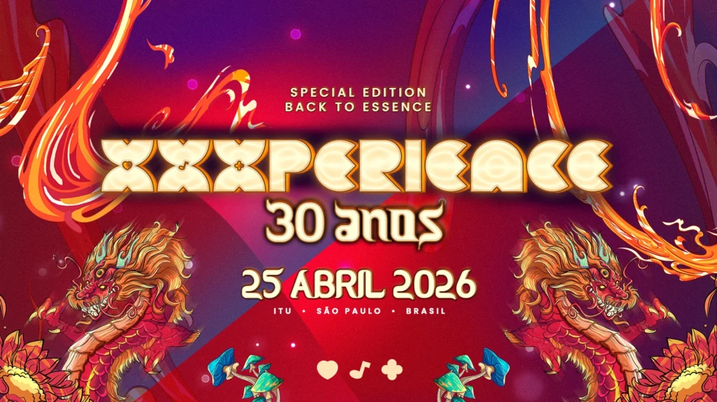 Pessoas se divertindo no XXXPERIENCE 2026, com palcos e iluminação vibrante ao fundo.